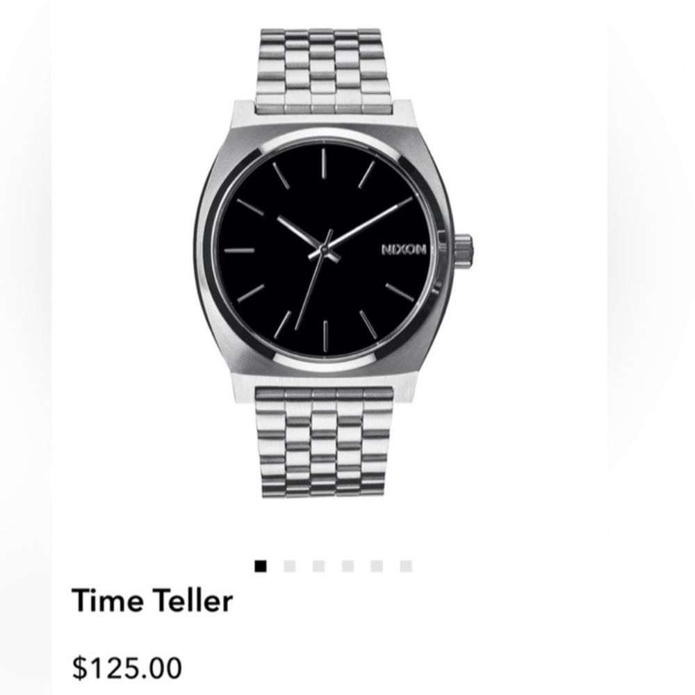 Nixon. Like new. Men’s or Women’s watch. 2 bracelets! Silver and black.